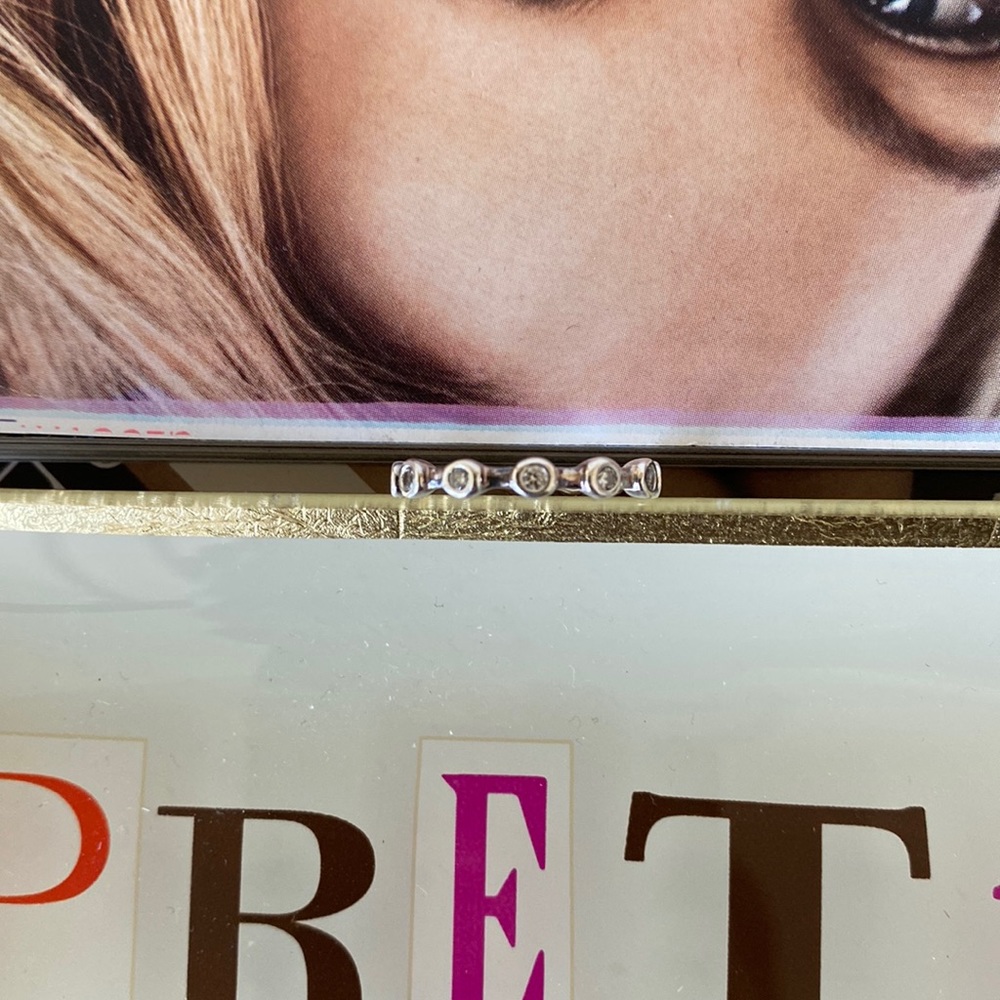 925 sterling silver band with cubic zirconia stones; size 7; NEW